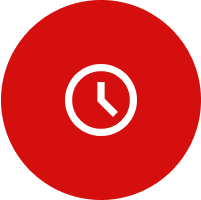 A red circle with a white clock icon in the center, showing the time at approximately 10 o'clock, symbolizing efficient commercial paper shredding processes.